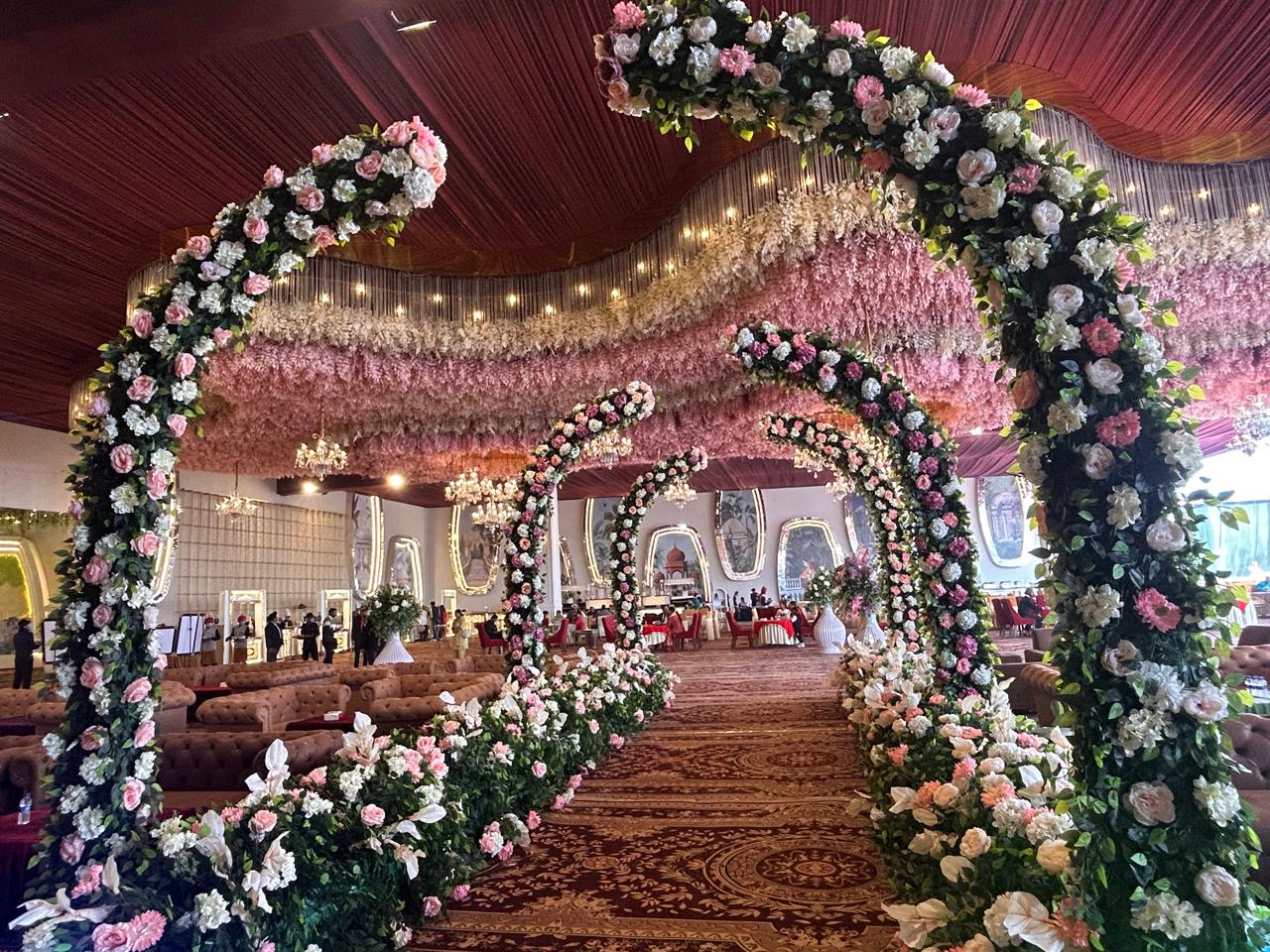 Royal King Villa floral arch walkway
